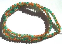 16 inch Strand of 4mm Orange and Green Crackle Glass Beads